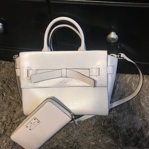 Kate spade handbag with matching wallet.